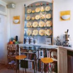 This display cabinet is made from a 9 ply furniture grade plywood. The end grain is quite beautiful. The stainless steel is a laminate or veneer applied to the plywood. The stainless steel works well with the glass shelving and glass table.