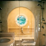 The curves really make this master bath. The vanities have curved toe kicks with decorative leg, the dressing table is supported by the vanities.