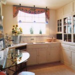In this kitchen the floor to ceiling cabinets are the original cabinets. They were modified by adding maple ply drawers on full extension drawer slides, and new doors and drawer faces. I like the way all the different materials bring this kitchen together, and stay consistent with the original style.